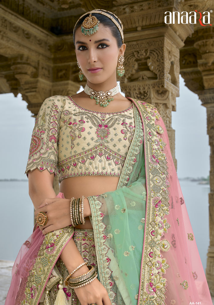 pastel coloured silk ghaghra blouse set with 2 net dupattas