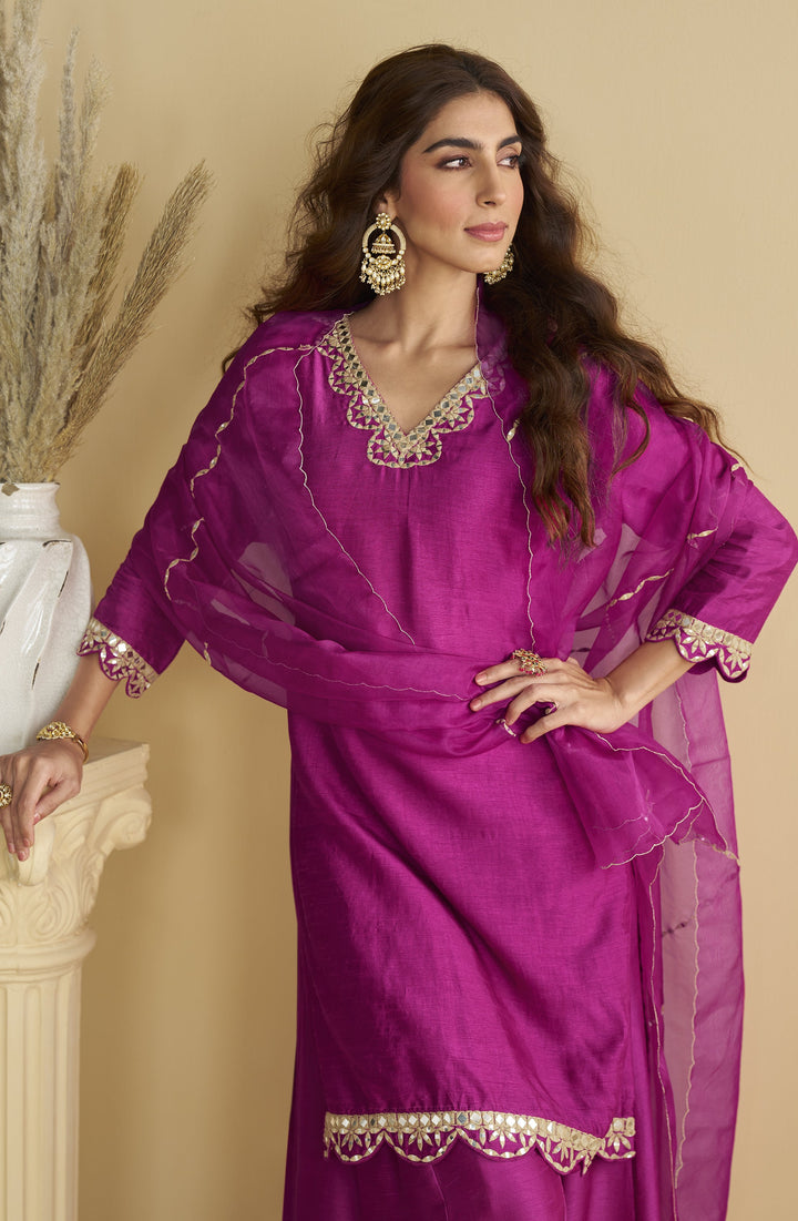 designer outfit in rani apt for marriage functions