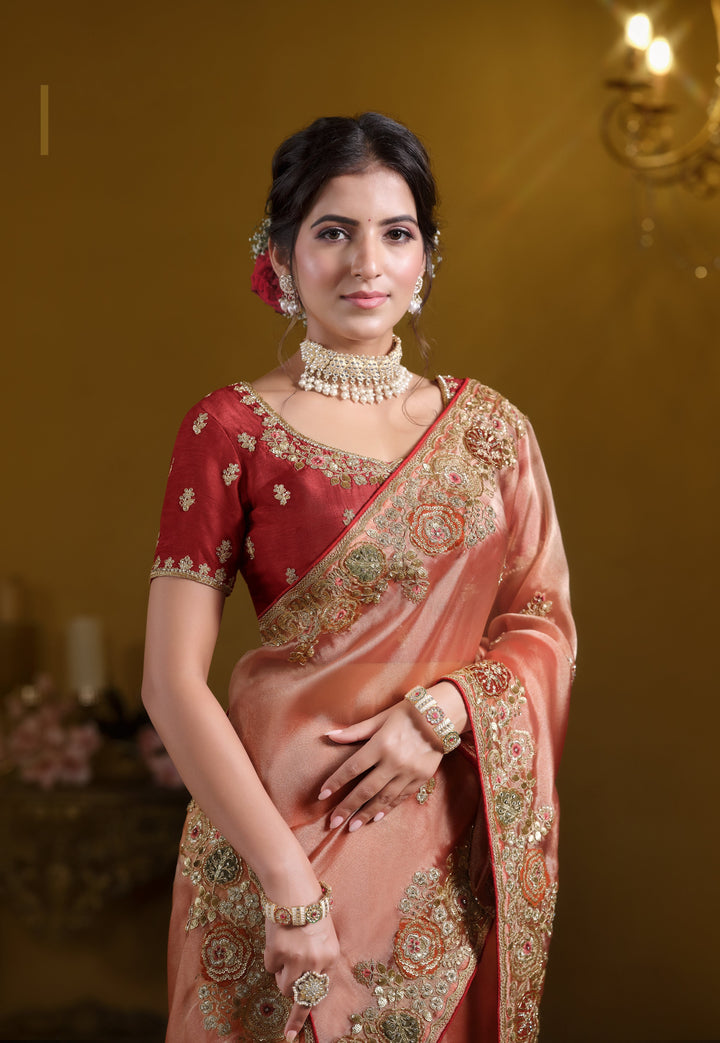 traditional tissue silk festive saree with pink blouse